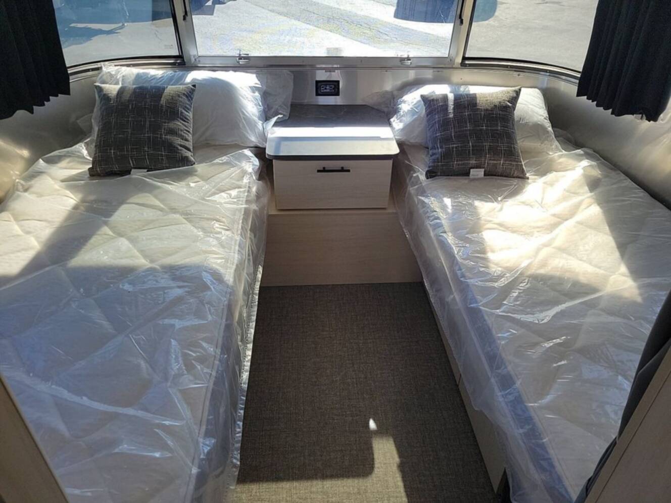A photo of this 2026 Airstream Flying Cloud ® 25FB Midnight Flamingo