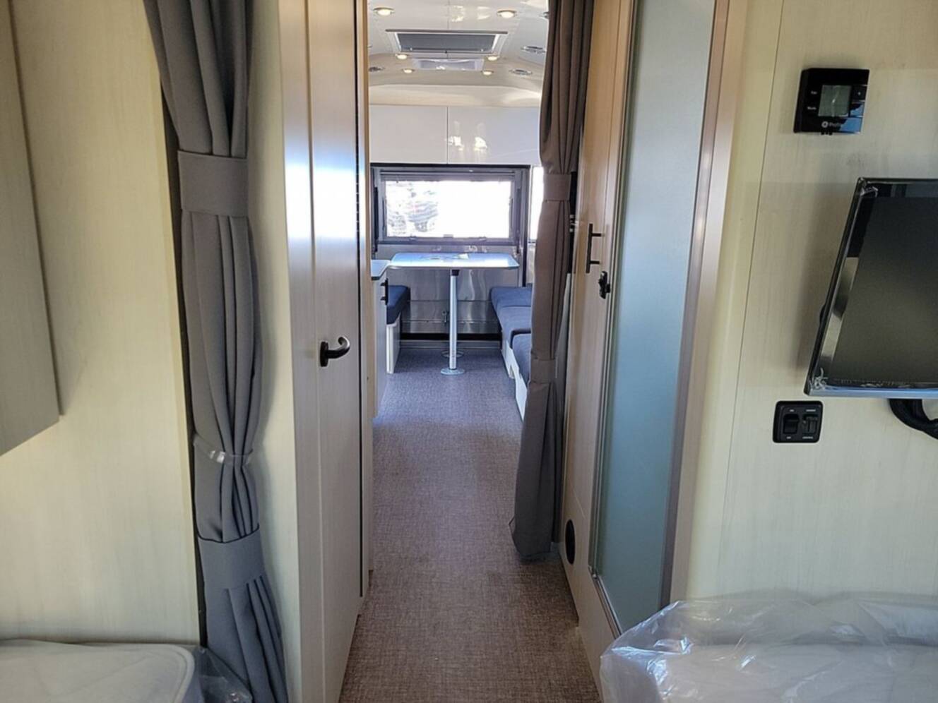 A photo of this 2026 Airstream Flying Cloud ® 25FB Midnight Flamingo