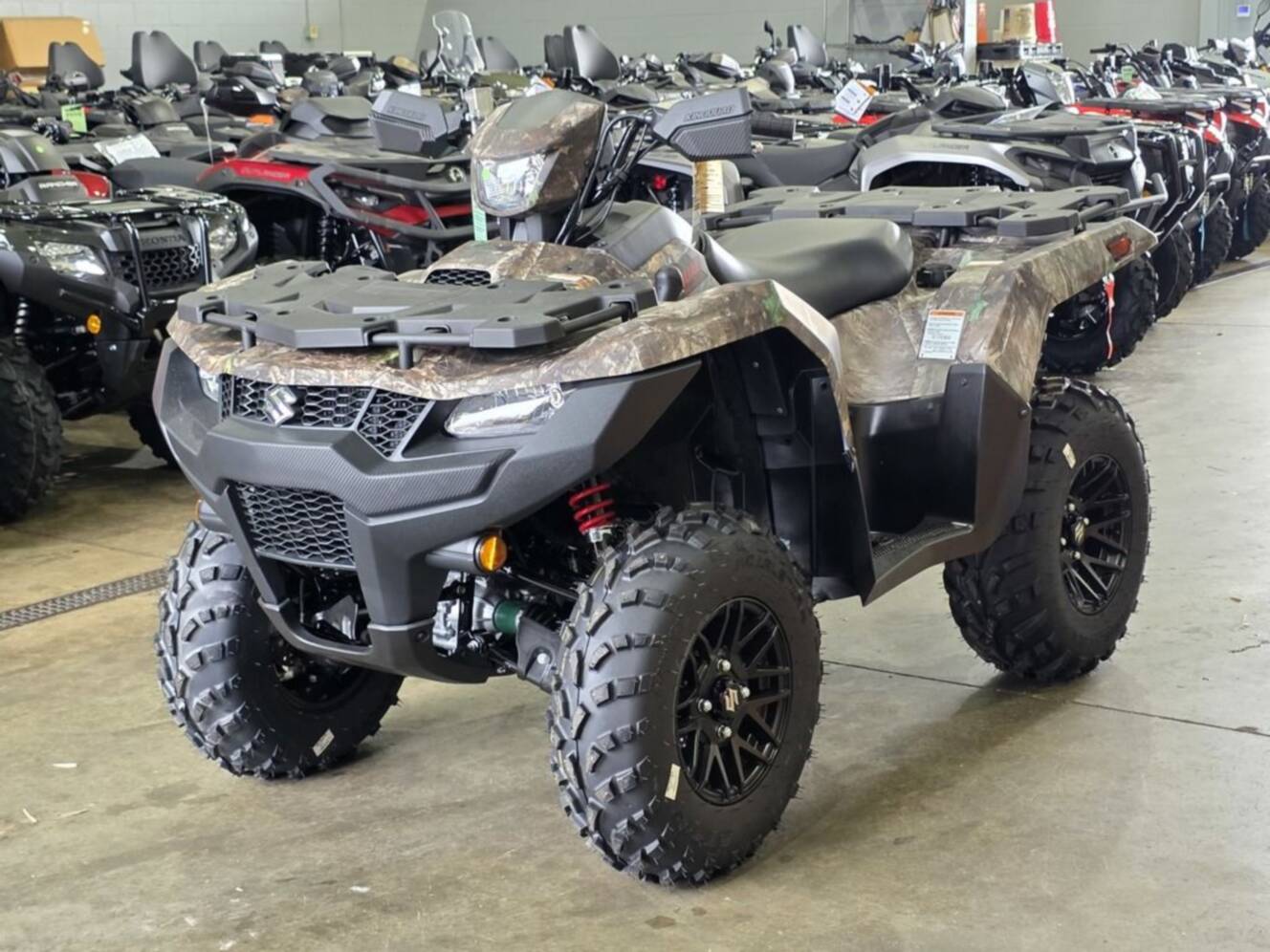 A photo of this 2025 Suzuki KingQuad 750AXi Power Steering SE Camo