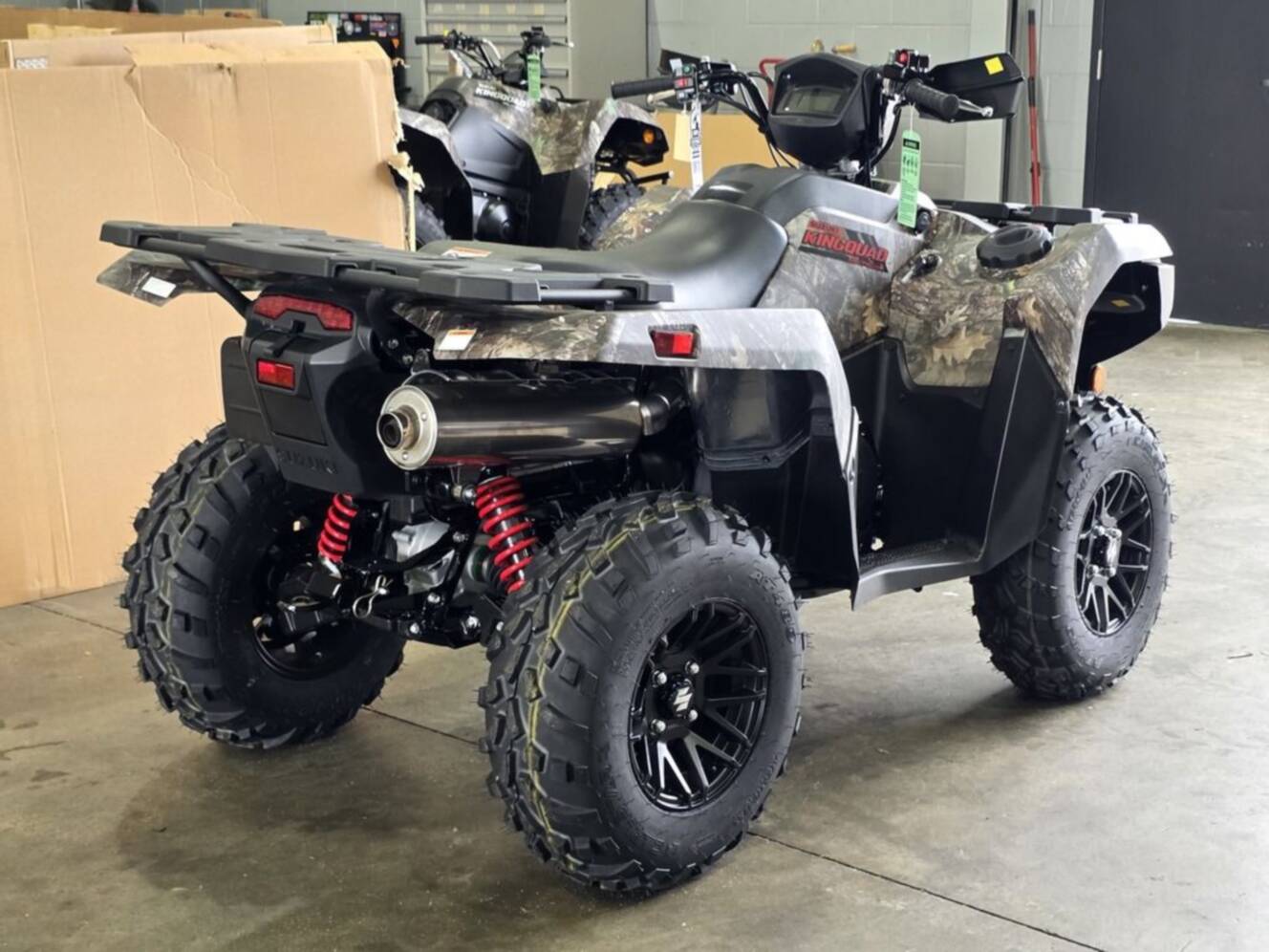 A photo of this 2025 Suzuki KingQuad 750AXi Power Steering SE Camo