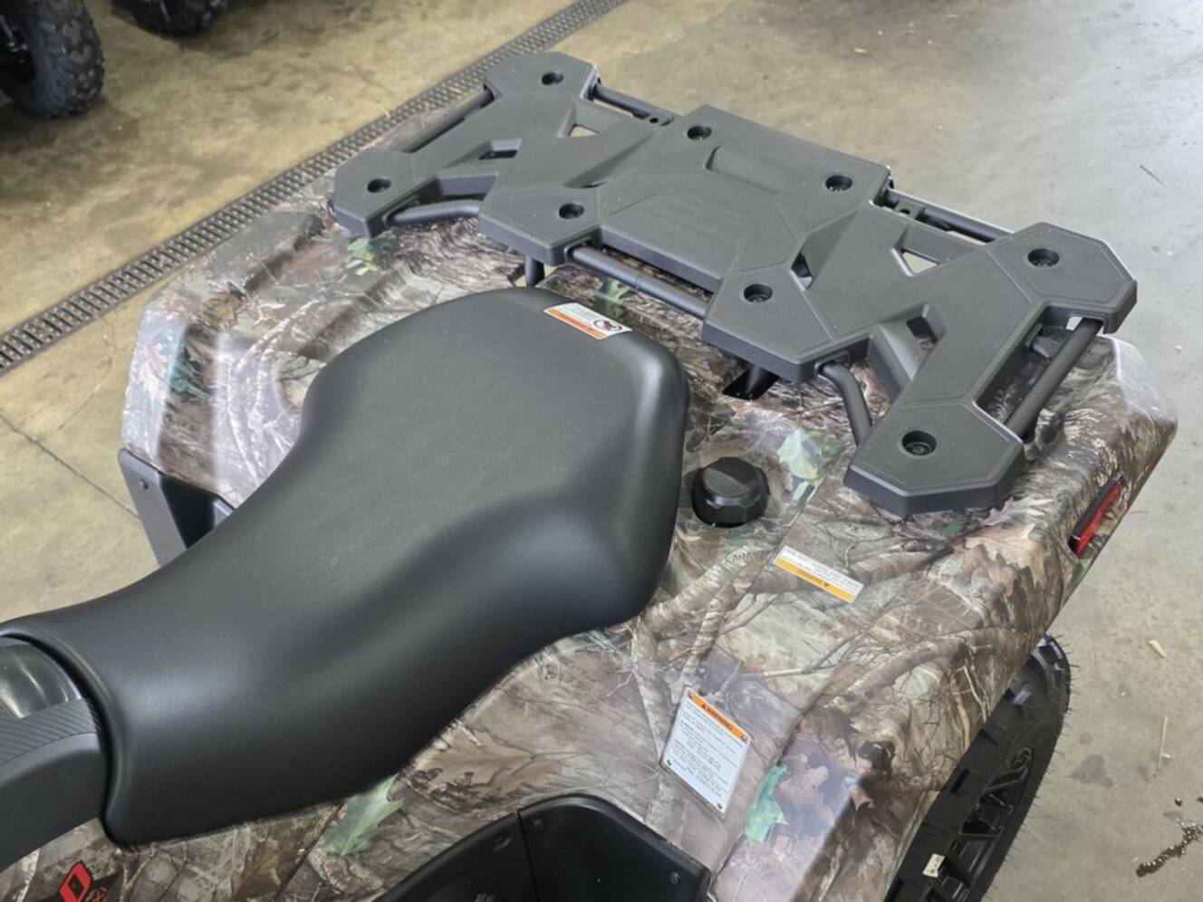 A photo of this 2025 Suzuki KingQuad 750AXi Power Steering SE Camo