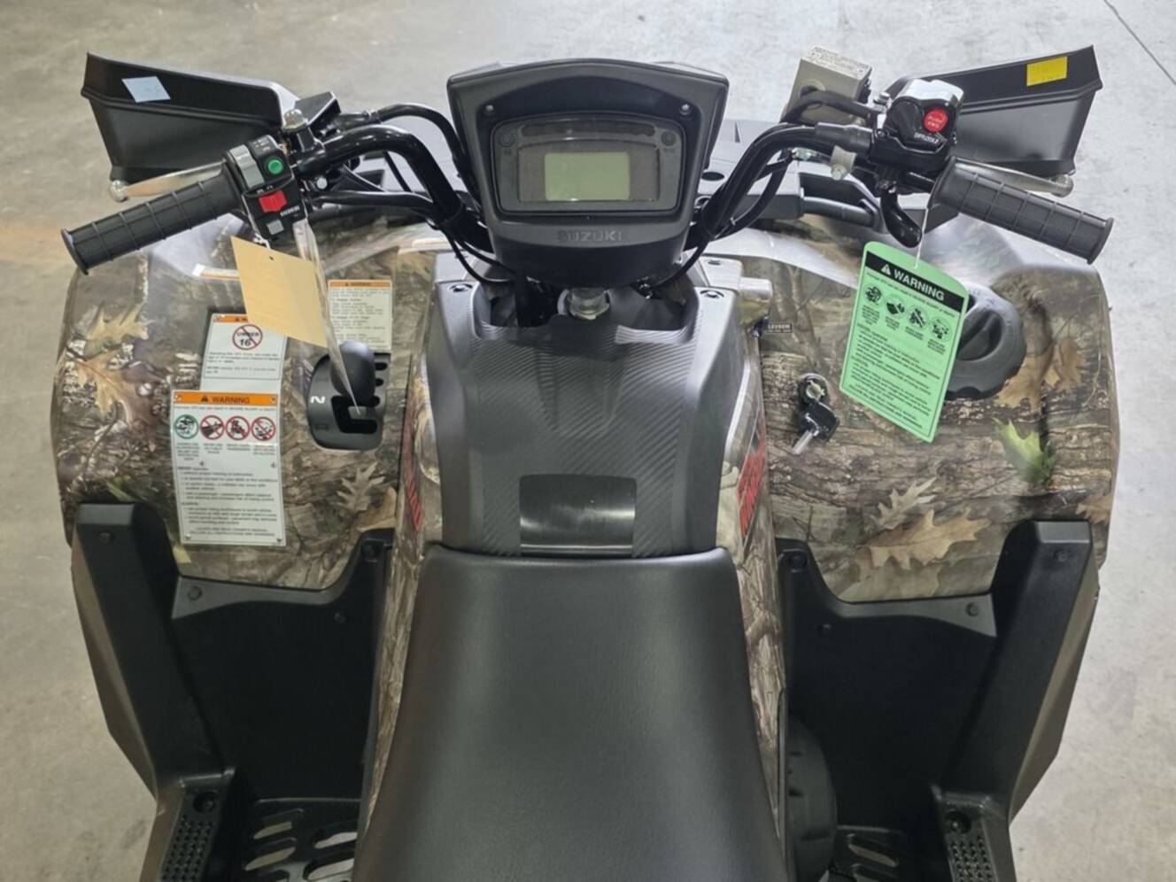 A photo of this 2025 Suzuki KingQuad 750AXi Power Steering SE Camo