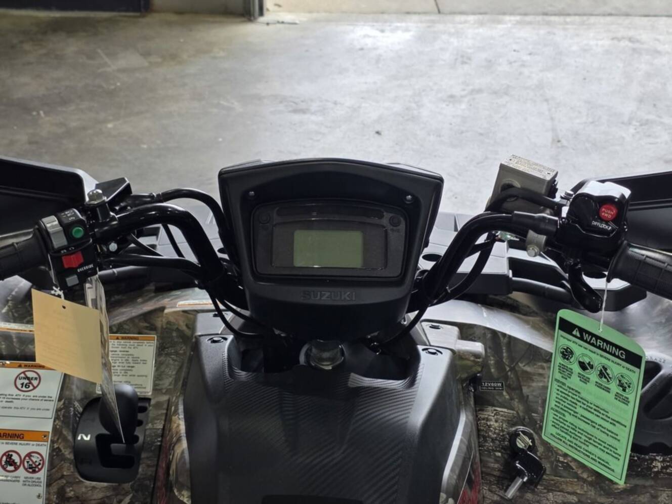 A photo of this 2025 Suzuki KingQuad 750AXi Power Steering SE Camo