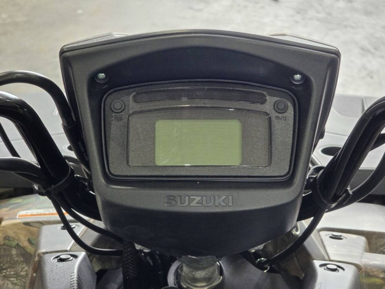 A photo of this 2025 Suzuki KingQuad 750AXi Power Steering SE Camo