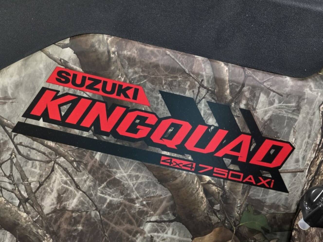 A photo of this 2025 Suzuki KingQuad 750AXi Power Steering SE Camo