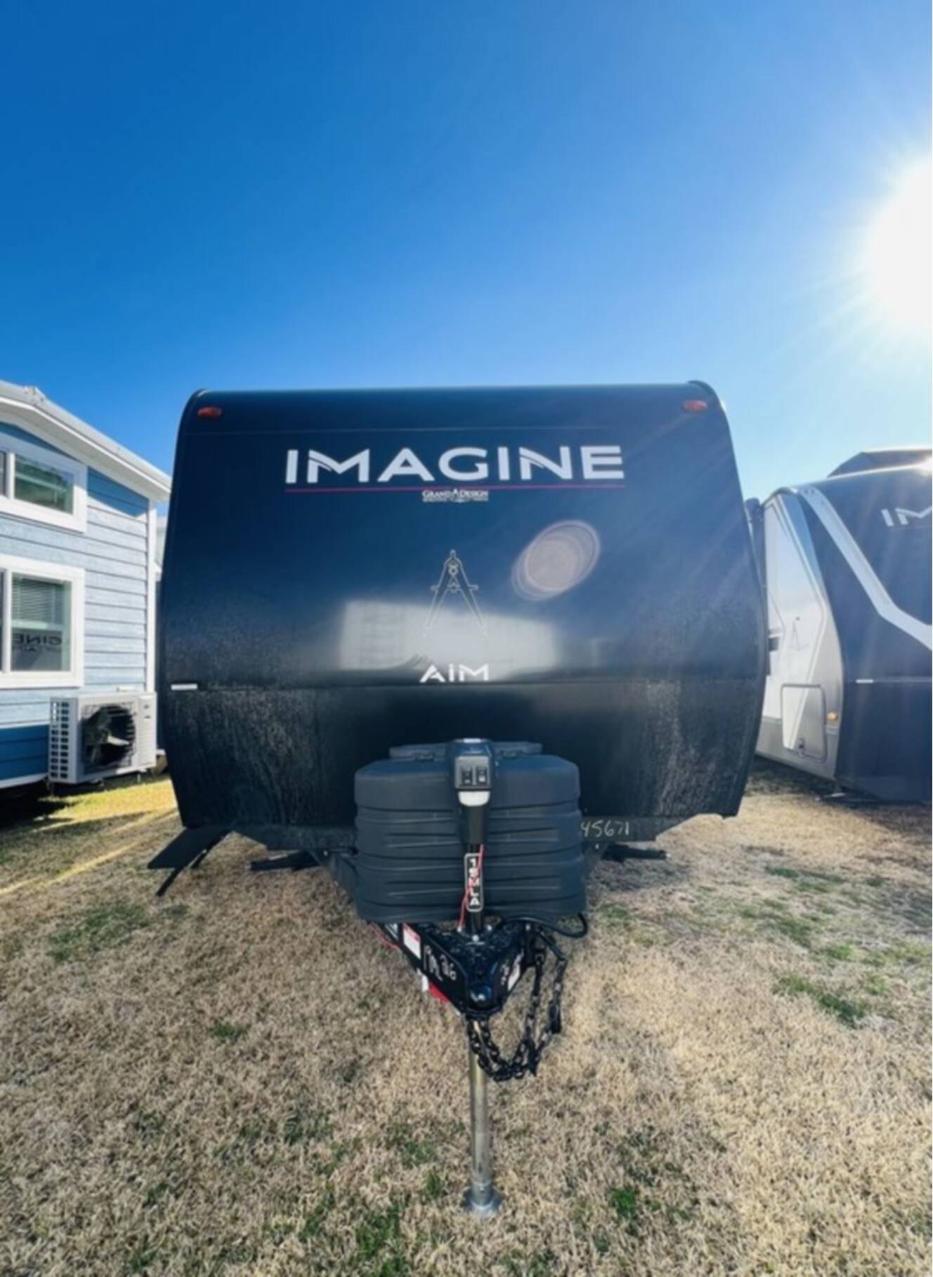 A photo of this 2026 Grand Design Imagine AIM 19MLA