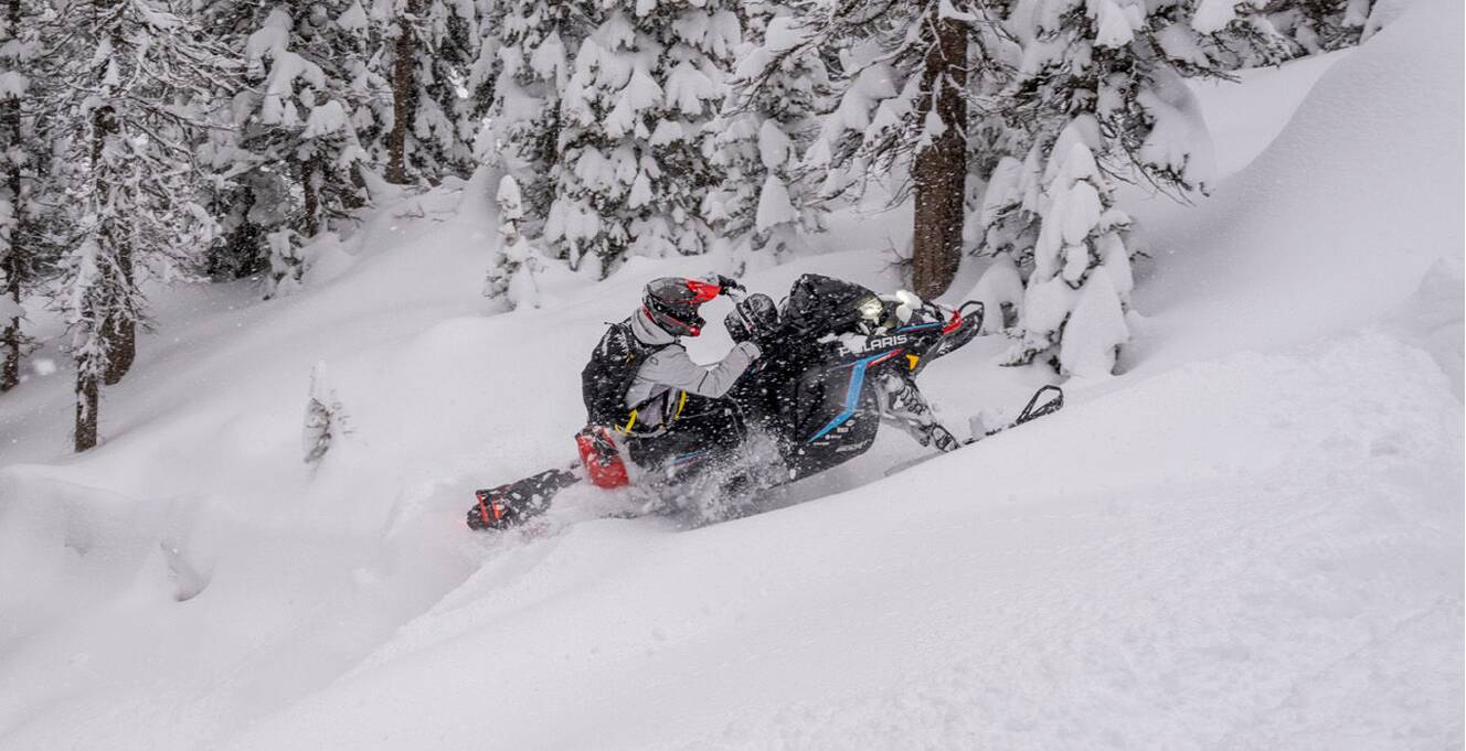 A photo of this 2027 Polaris Patriot Boost RMK Factory Edition 155 Indy Red 325 SC