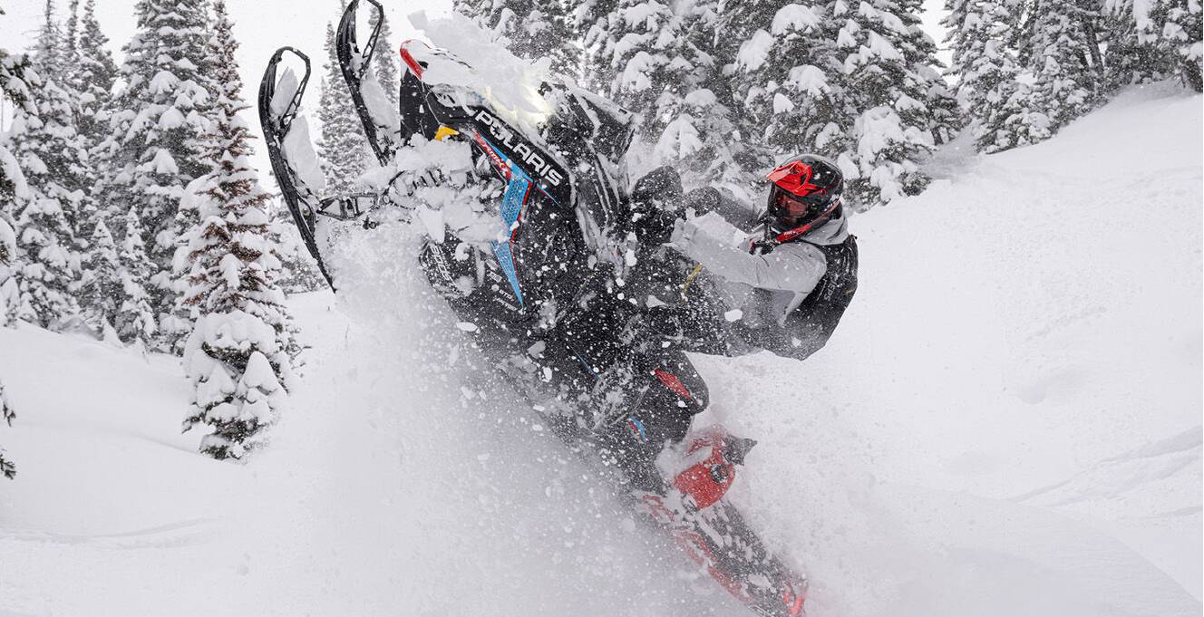 A photo of this 2027 Polaris Patriot Boost RMK Factory Edition 155 Indy Red 325 SC