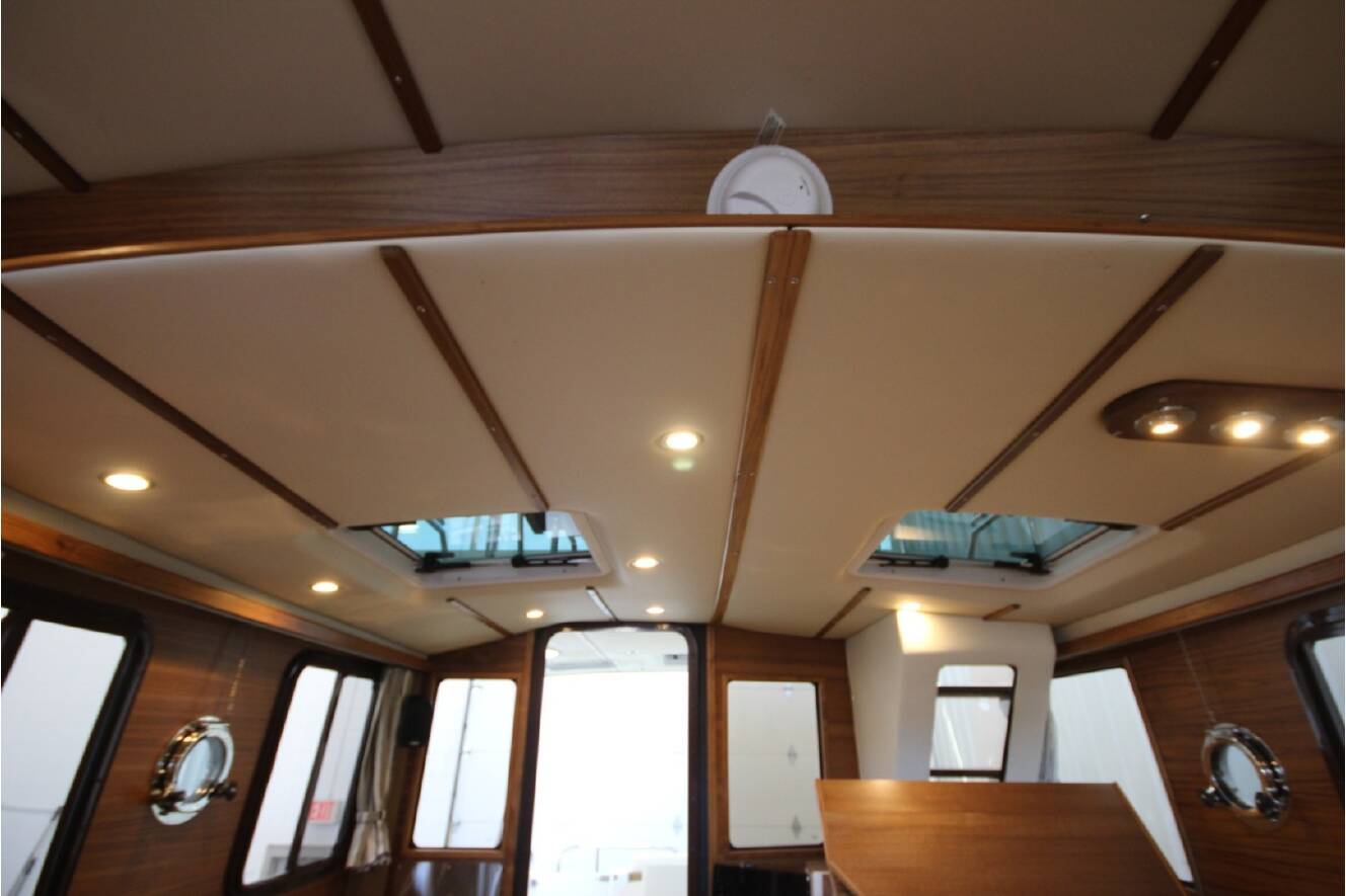 A photo of this 2026 Ranger Tugs R-31 Command Bridge Luxury Edition