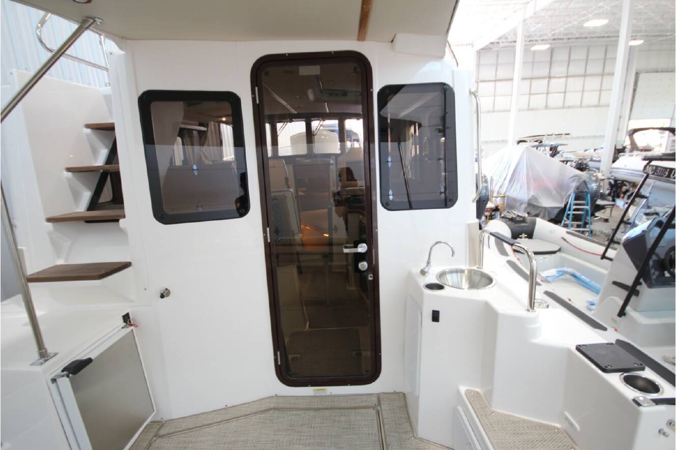 A photo of this 2026 Ranger Tugs R-31 Command Bridge Luxury Edition