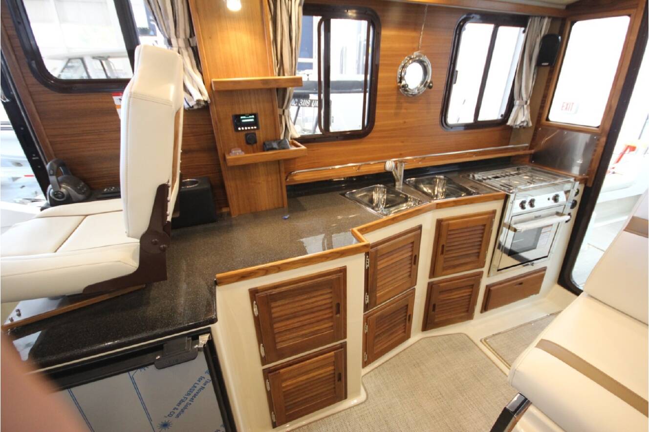 A photo of this 2026 Ranger Tugs R-31 Command Bridge Luxury Edition