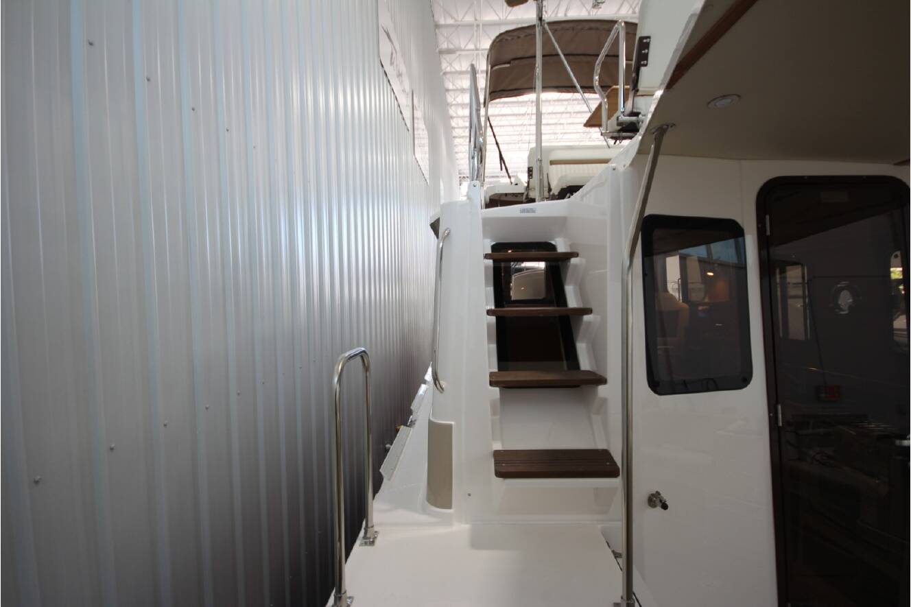 A photo of this 2026 Ranger Tugs R-31 Command Bridge Luxury Edition
