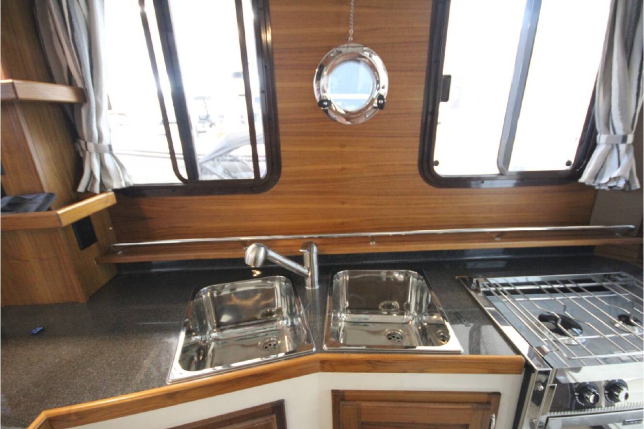 A photo of this 2026 Ranger Tugs R-31 Command Bridge Luxury Edition