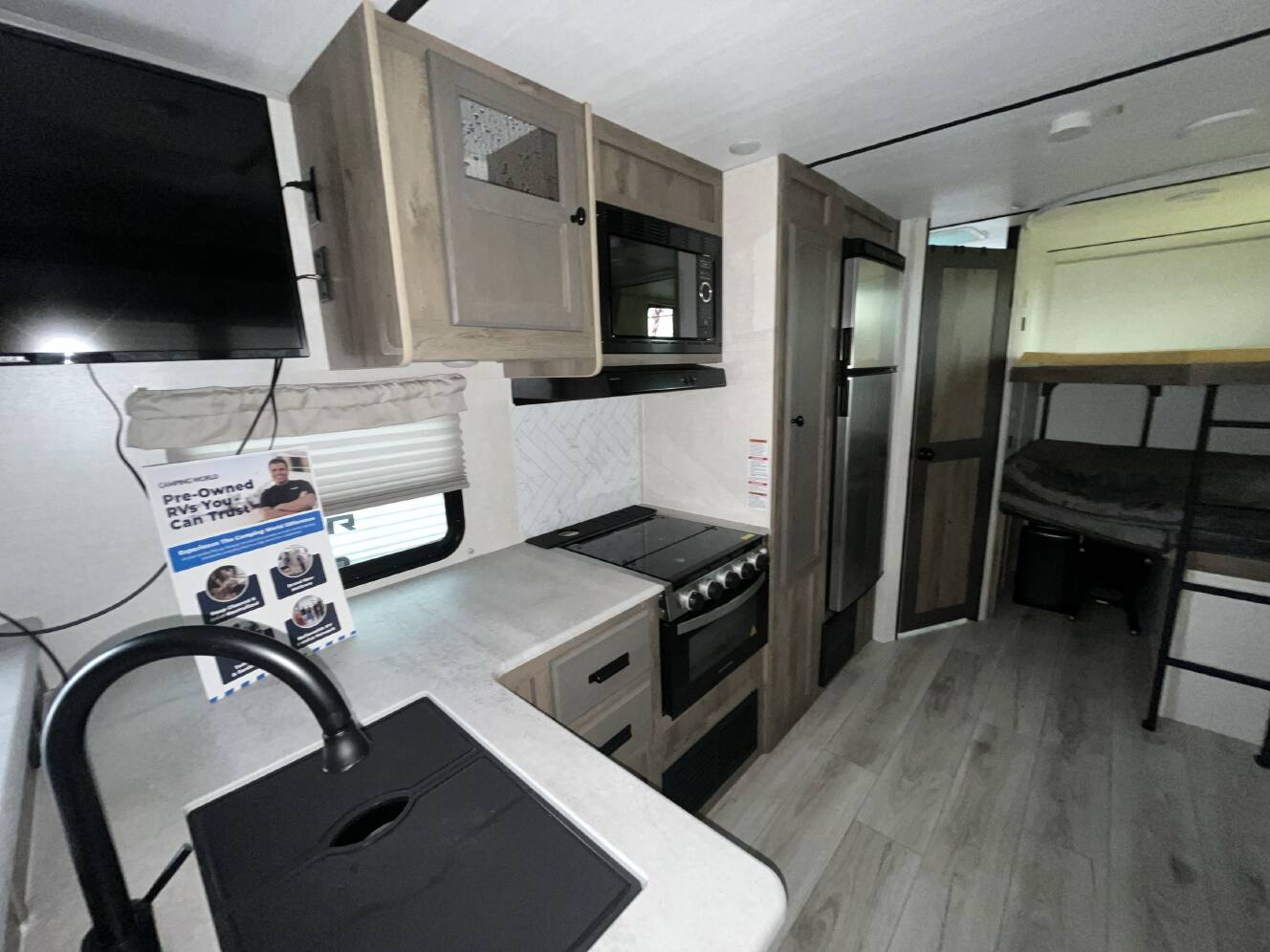 A photo of this 2022 Forest River SURVEYOR 276BHLE