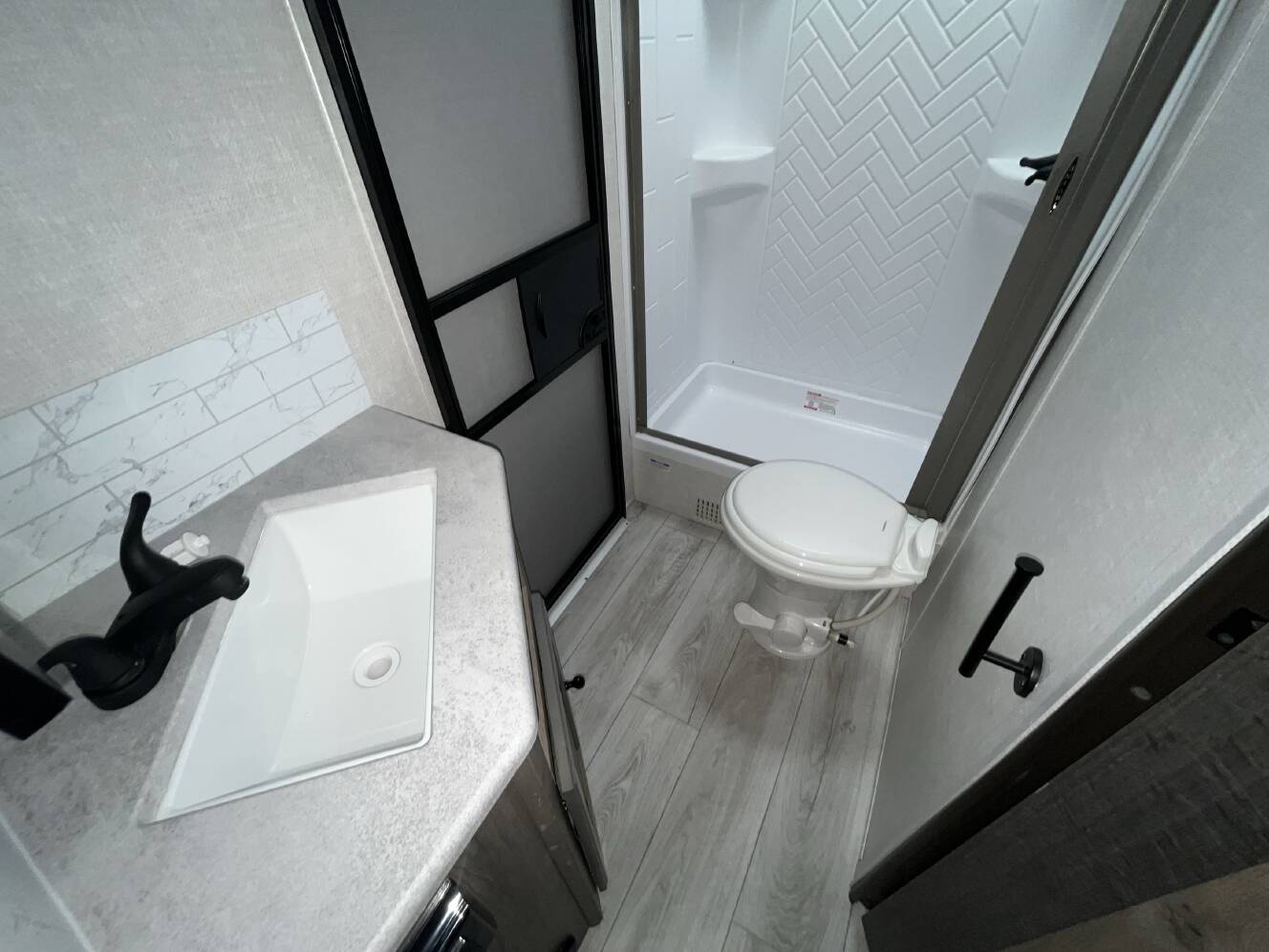 A photo of this 2022 Forest River SURVEYOR 276BHLE