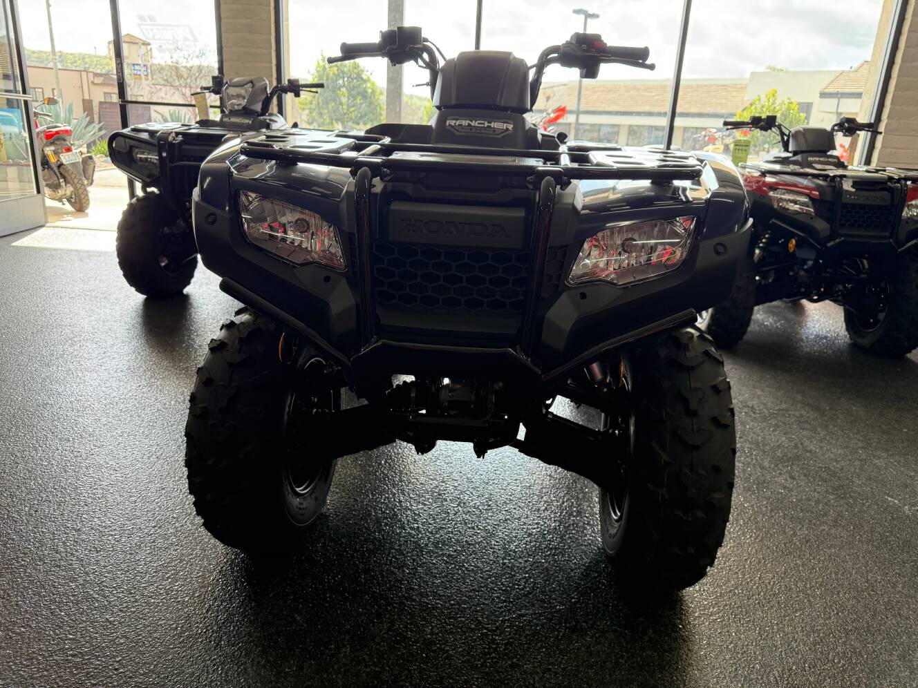 A photo of this 2025 Honda FOURTRAX RANCHER 4x4 AUTO DCT IRS EPS