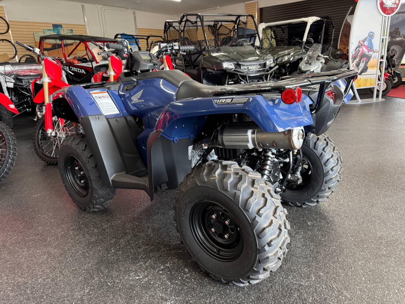 A photo of this 2025 Honda FOURTRAX RANCHER 4x4 AUTO DCT IRS EPS