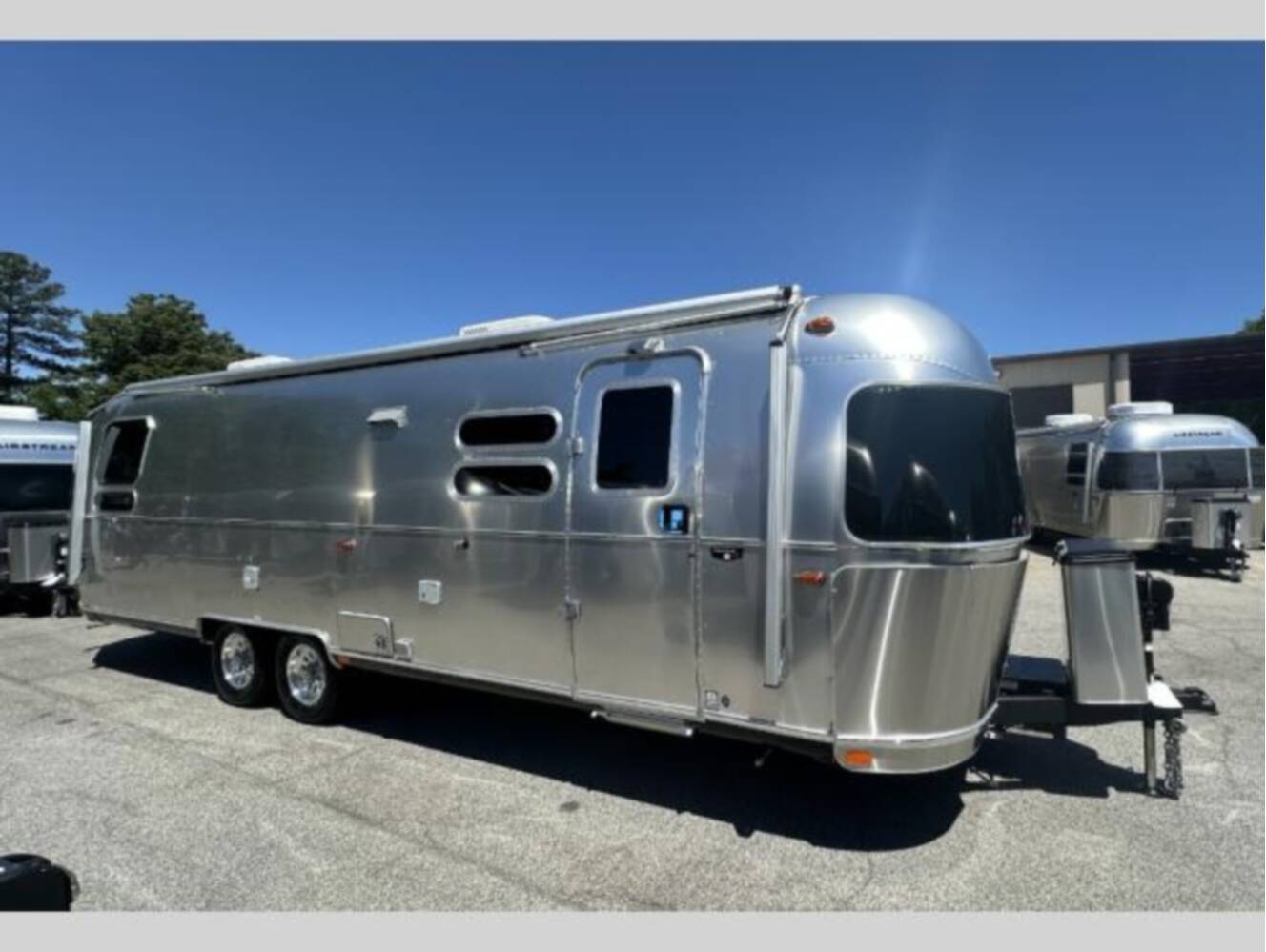 A photo of this 2026 Airstream Trade Wind 25FB Twin