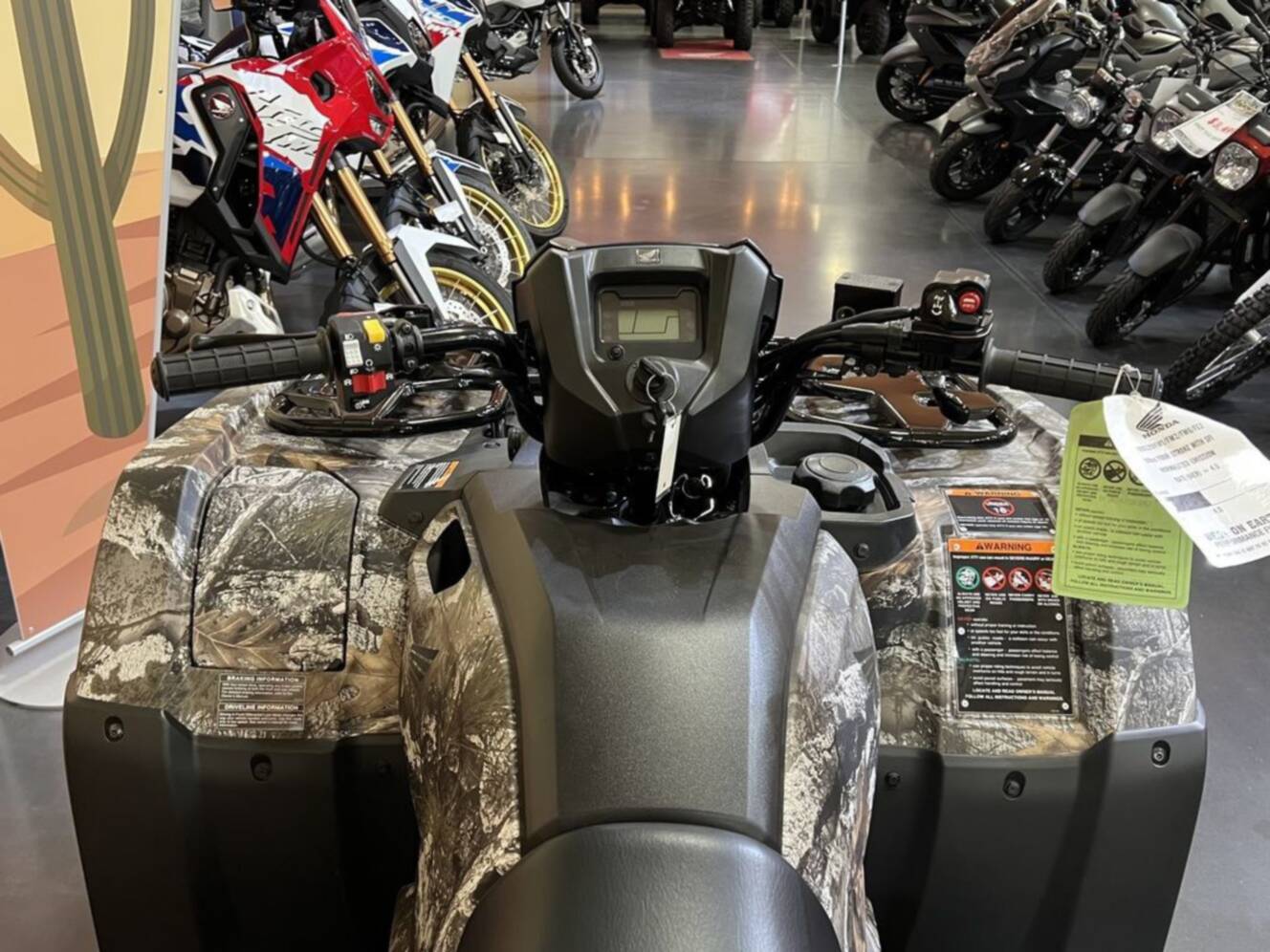 A photo of this 2027 Honda FourTrax Foreman 4X4 EPS Truetimber Atera Camo