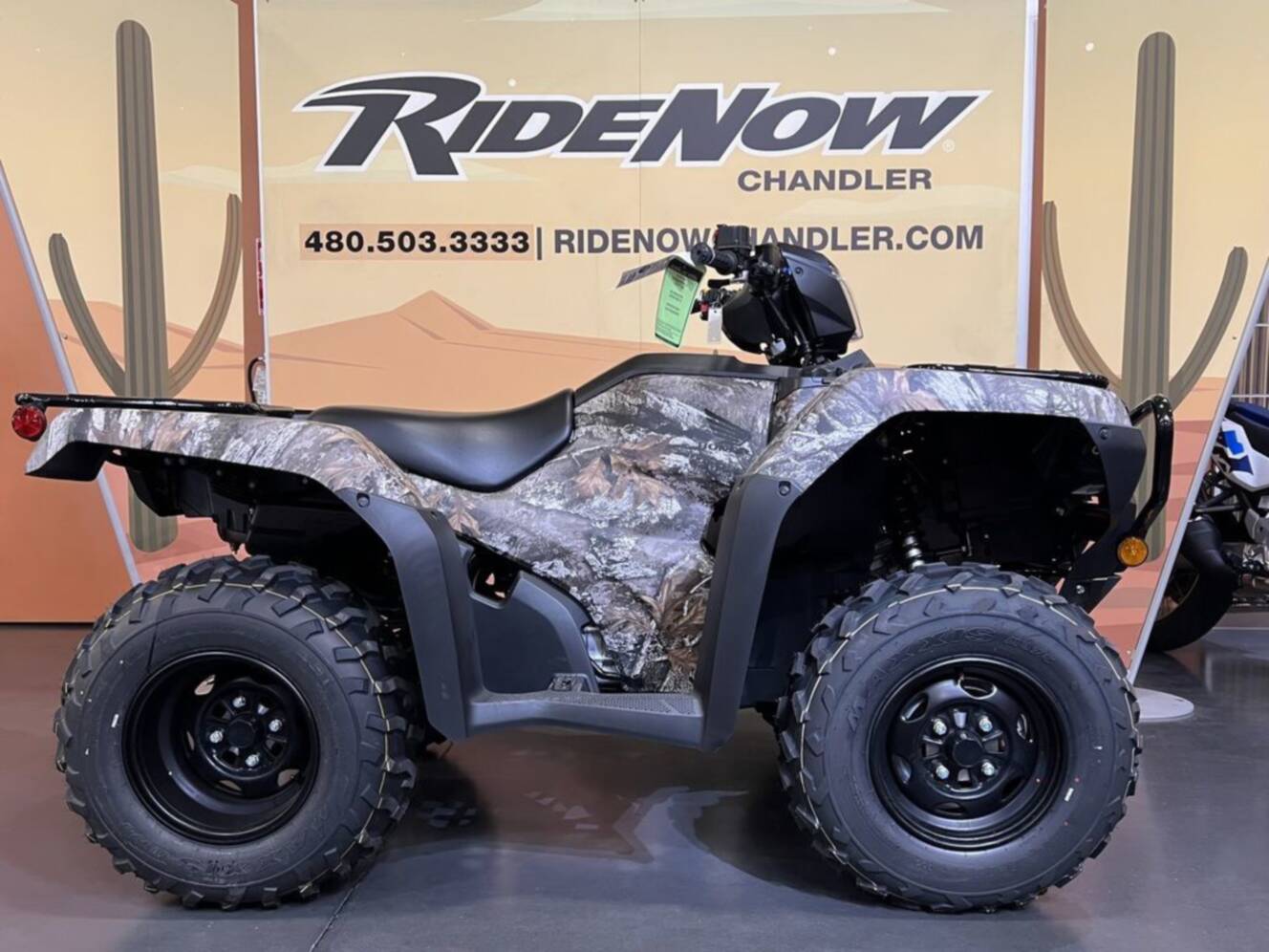 A photo of this 2027 Honda FourTrax Foreman 4X4 EPS Truetimber Atera Camo