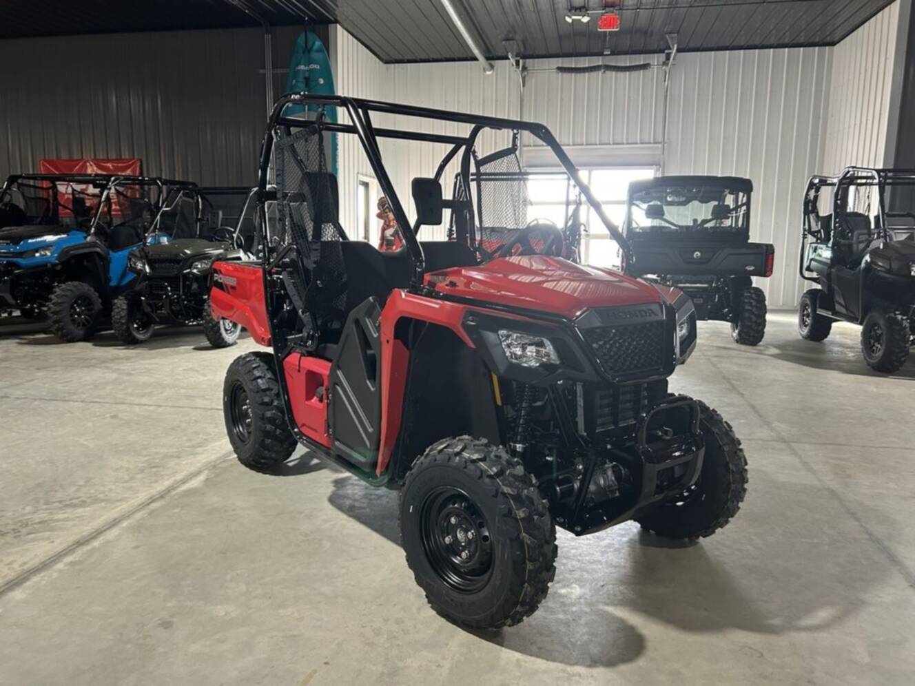 A photo of this 2026 Honda® PIONEER 520 Red
