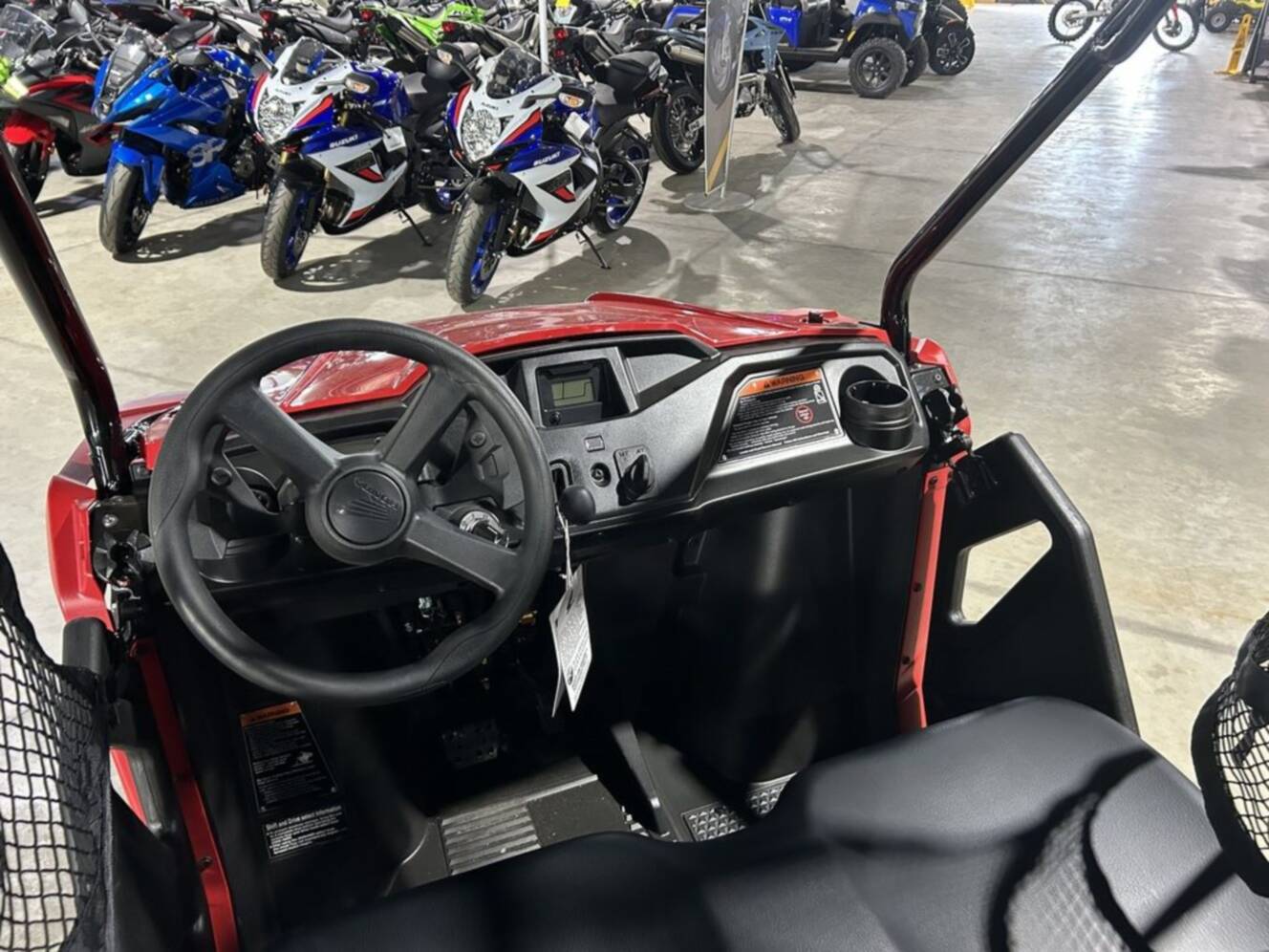 A photo of this 2026 Honda® PIONEER 520 Red