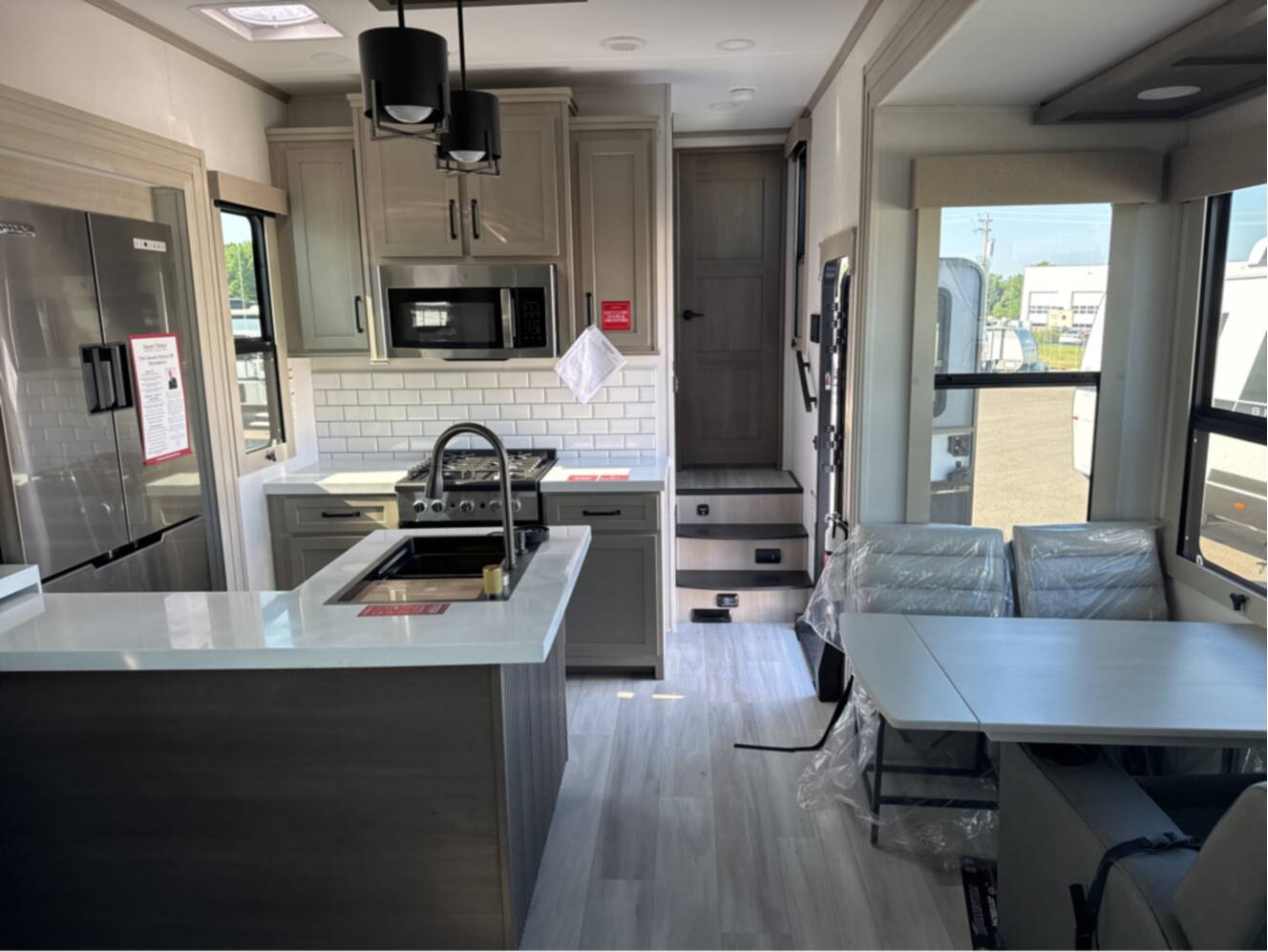 A photo of this 2026 Grand Design MOMENTUM M-CLASS 395MS