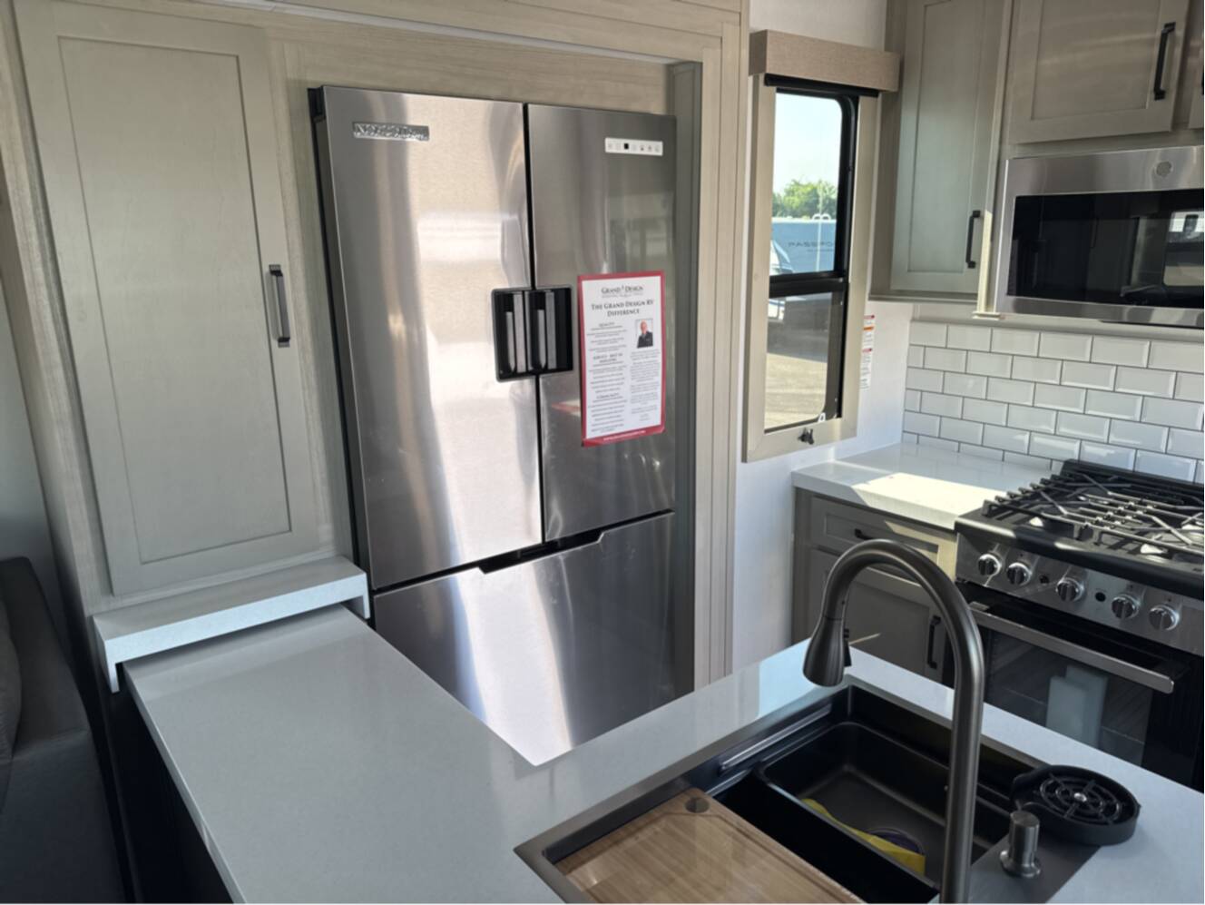A photo of this 2026 Grand Design MOMENTUM M-CLASS 395MS
