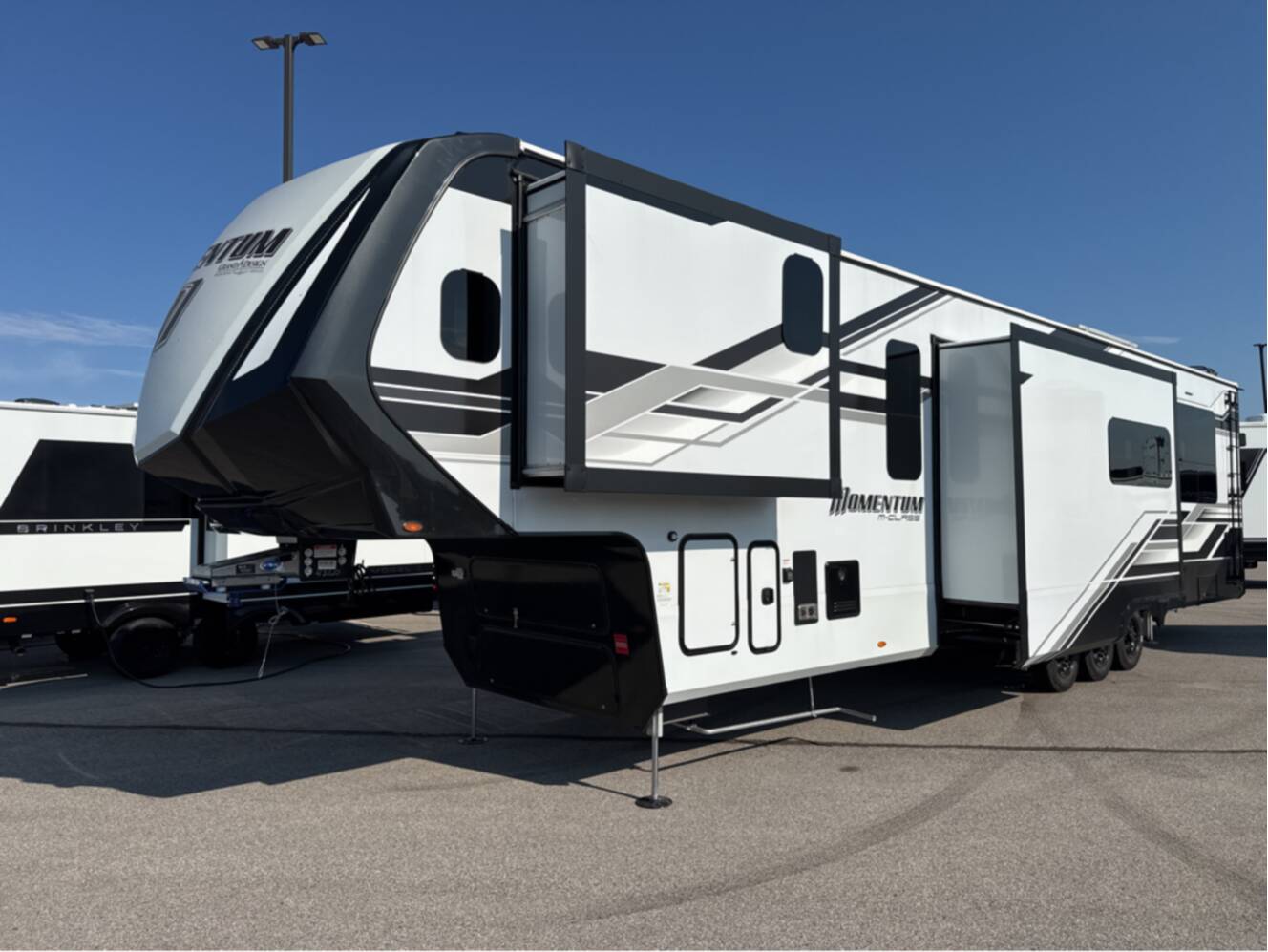 A photo of this 2026 Grand Design MOMENTUM M-CLASS 395MS