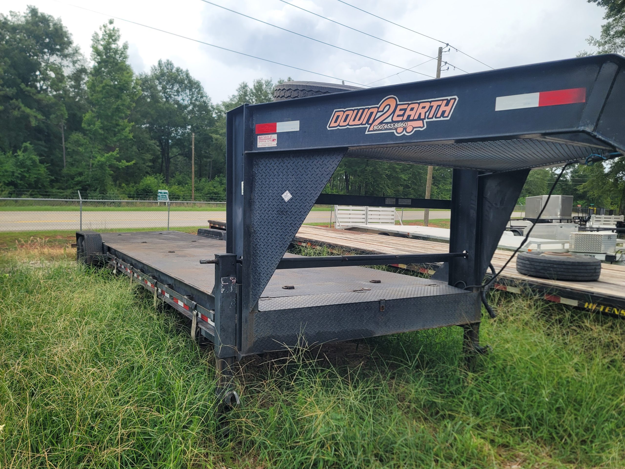 DOWN 2 EARTH Used 34' Steel Deck Gooseneck Car hauler Trailer in Byron, GA