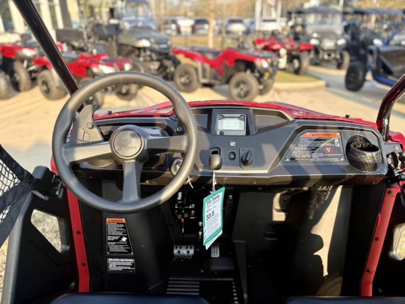A photo of this 2026 Honda® Pioneer 520