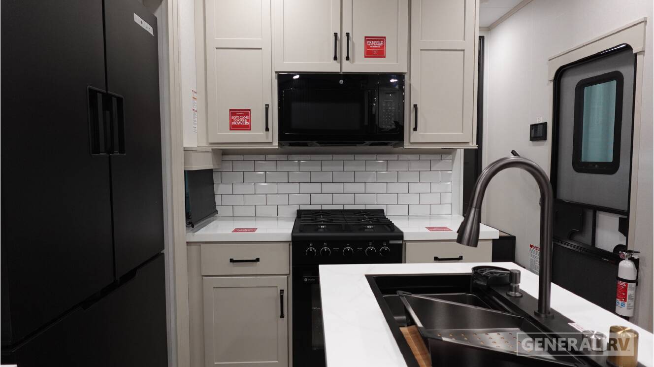 A photo of this 2026 Grand Design MOMENTUM 395MT
