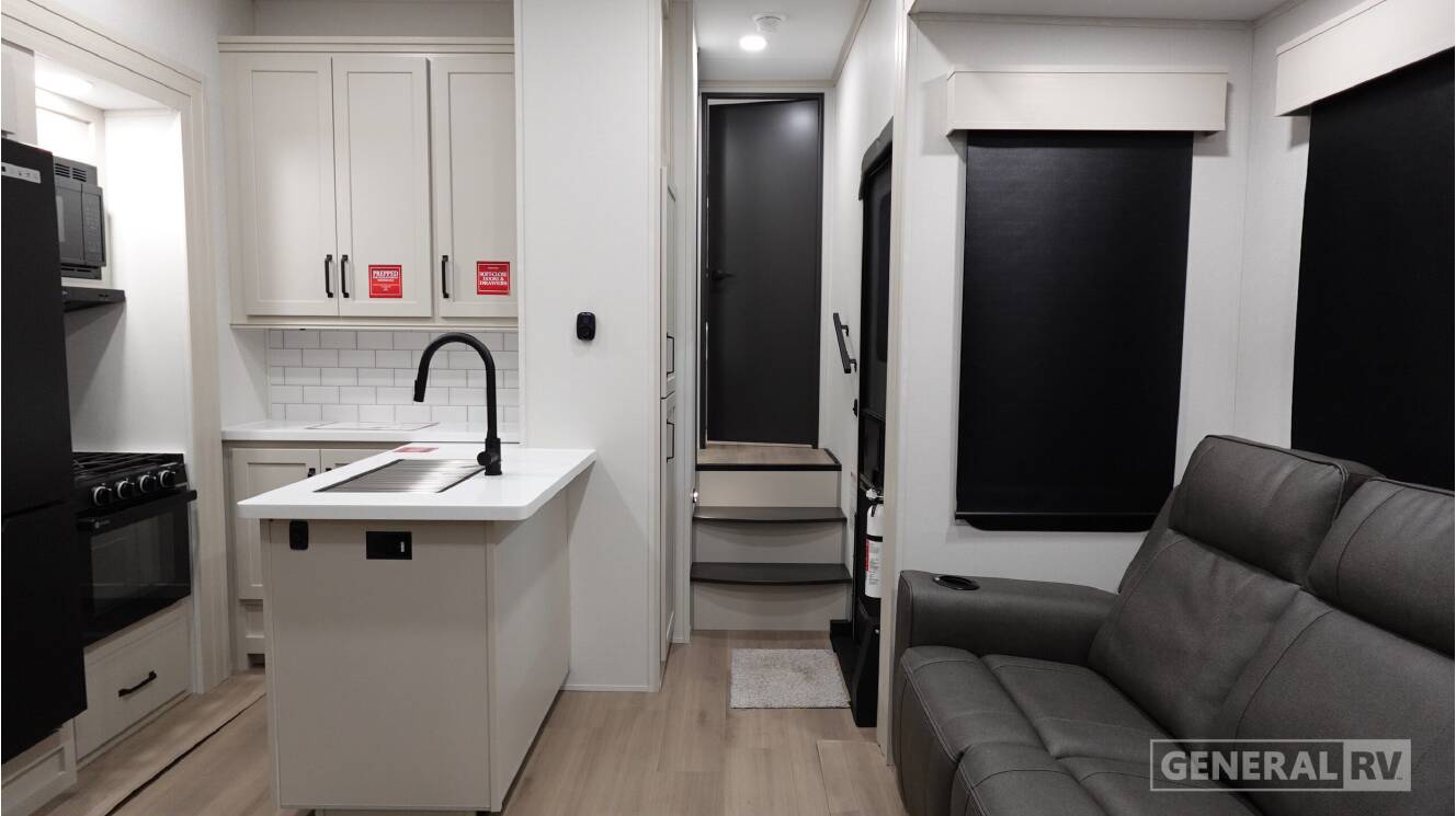A photo of this 2026 Grand Design Momentum G-Class 320G
