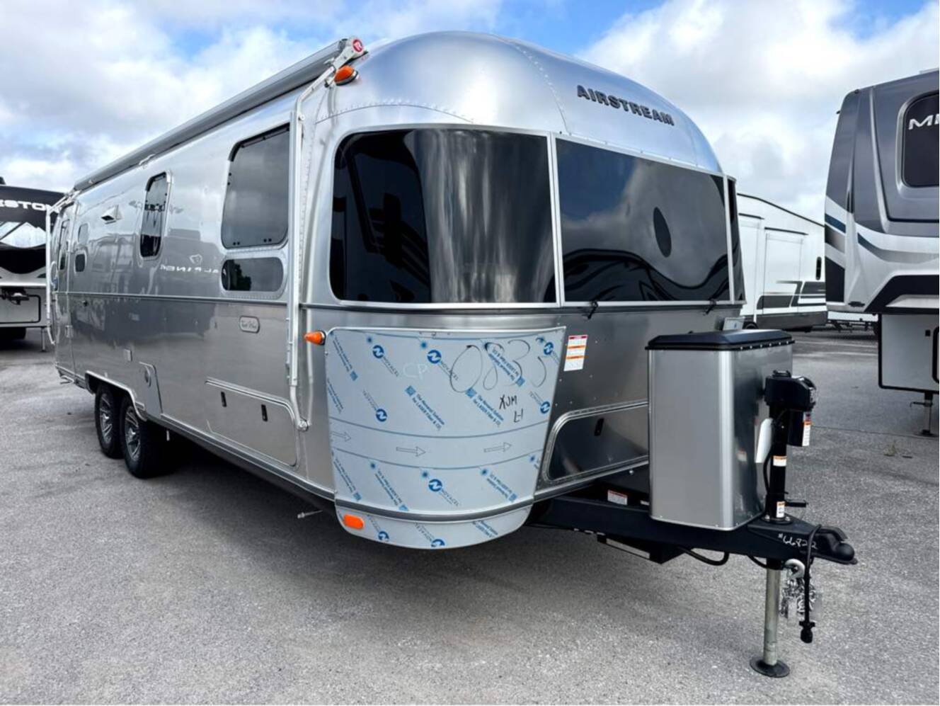 A photo of this 2027 Airstream Trade Wind 27FB Twin