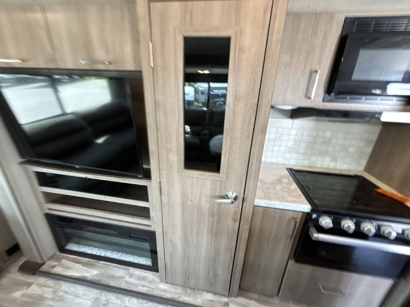 A photo of this 2023 Grand Design IMAGINE 2970RL