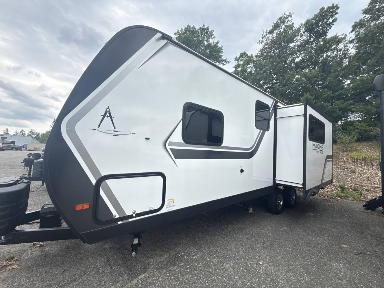 A photo of this 2025 Grand Design IMAGINE XLS 23LDE