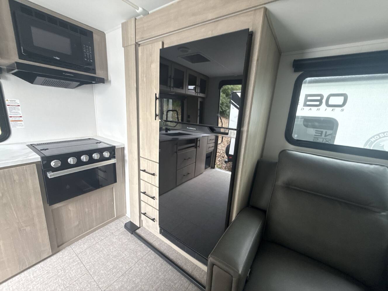 A photo of this 2025 Grand Design IMAGINE XLS 23LDE