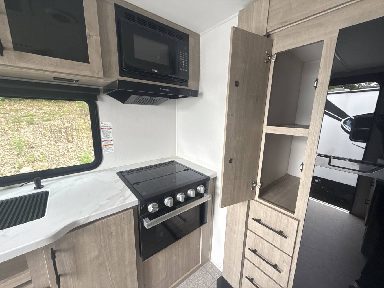 A photo of this 2025 Grand Design IMAGINE XLS 23LDE