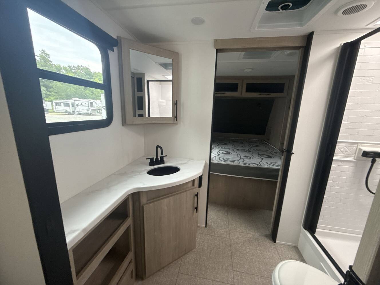 A photo of this 2025 Grand Design IMAGINE XLS 23LDE