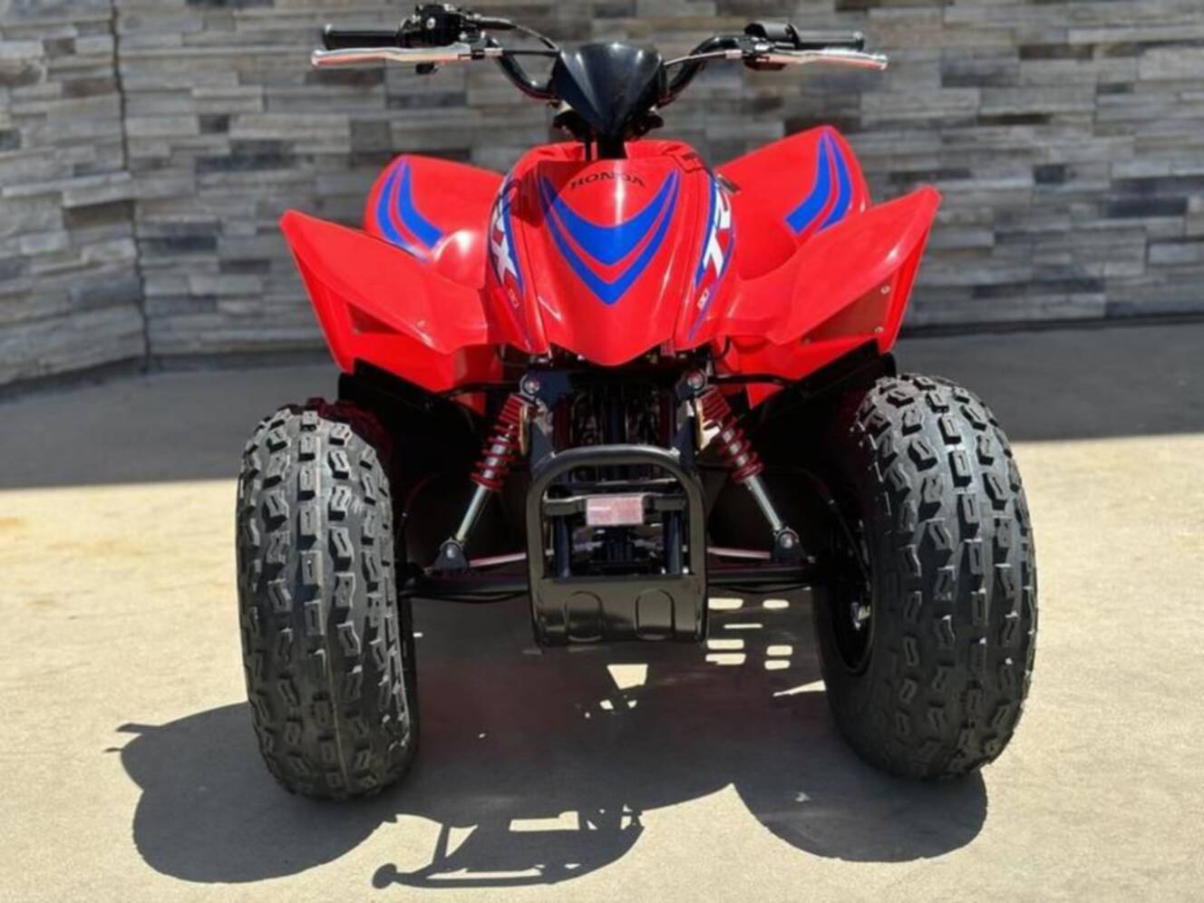 A photo of this 2026 Honda TRX 90X