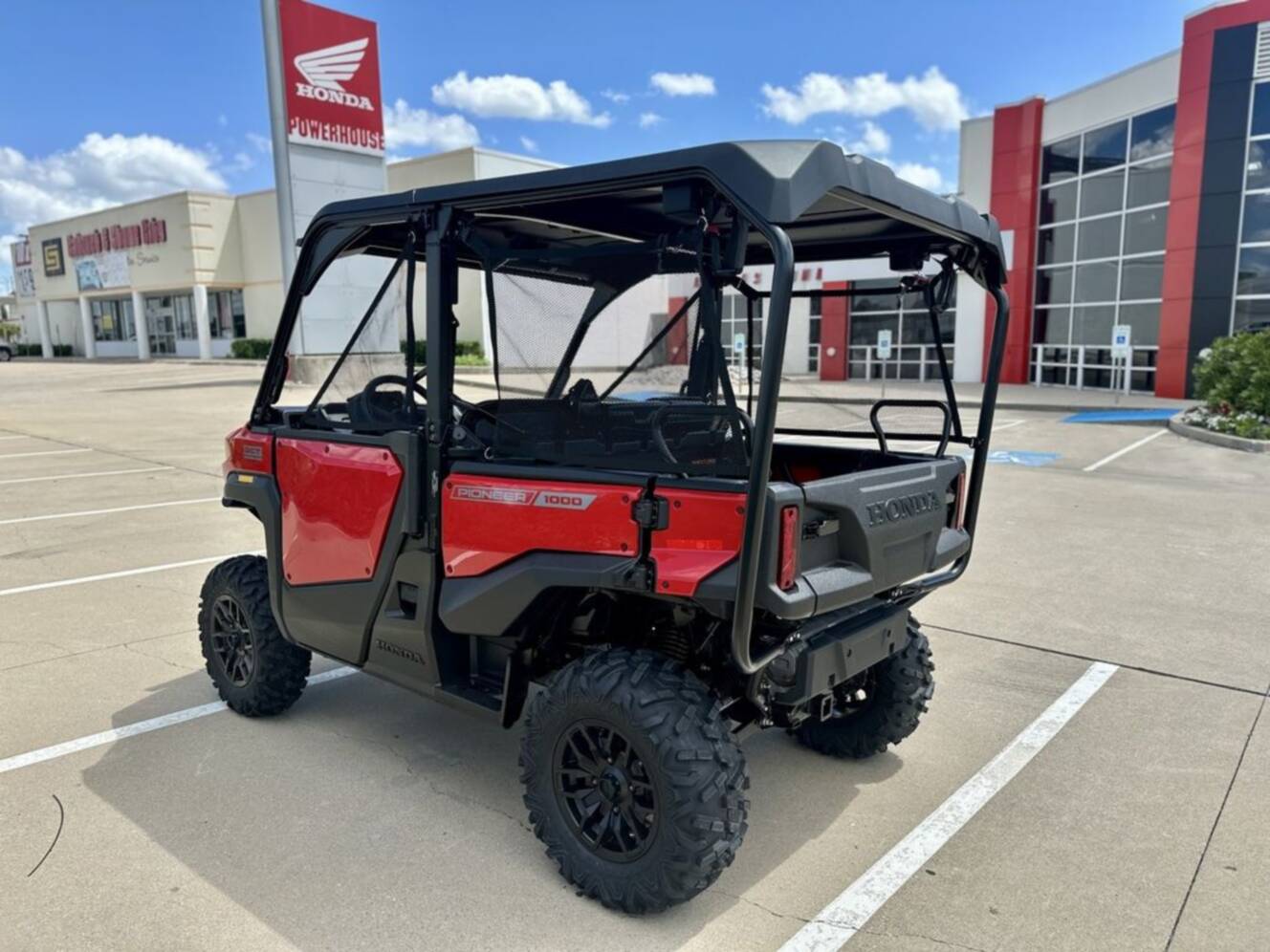 A photo of this 2026 Honda® Pioneer 1000-5 Deluxe