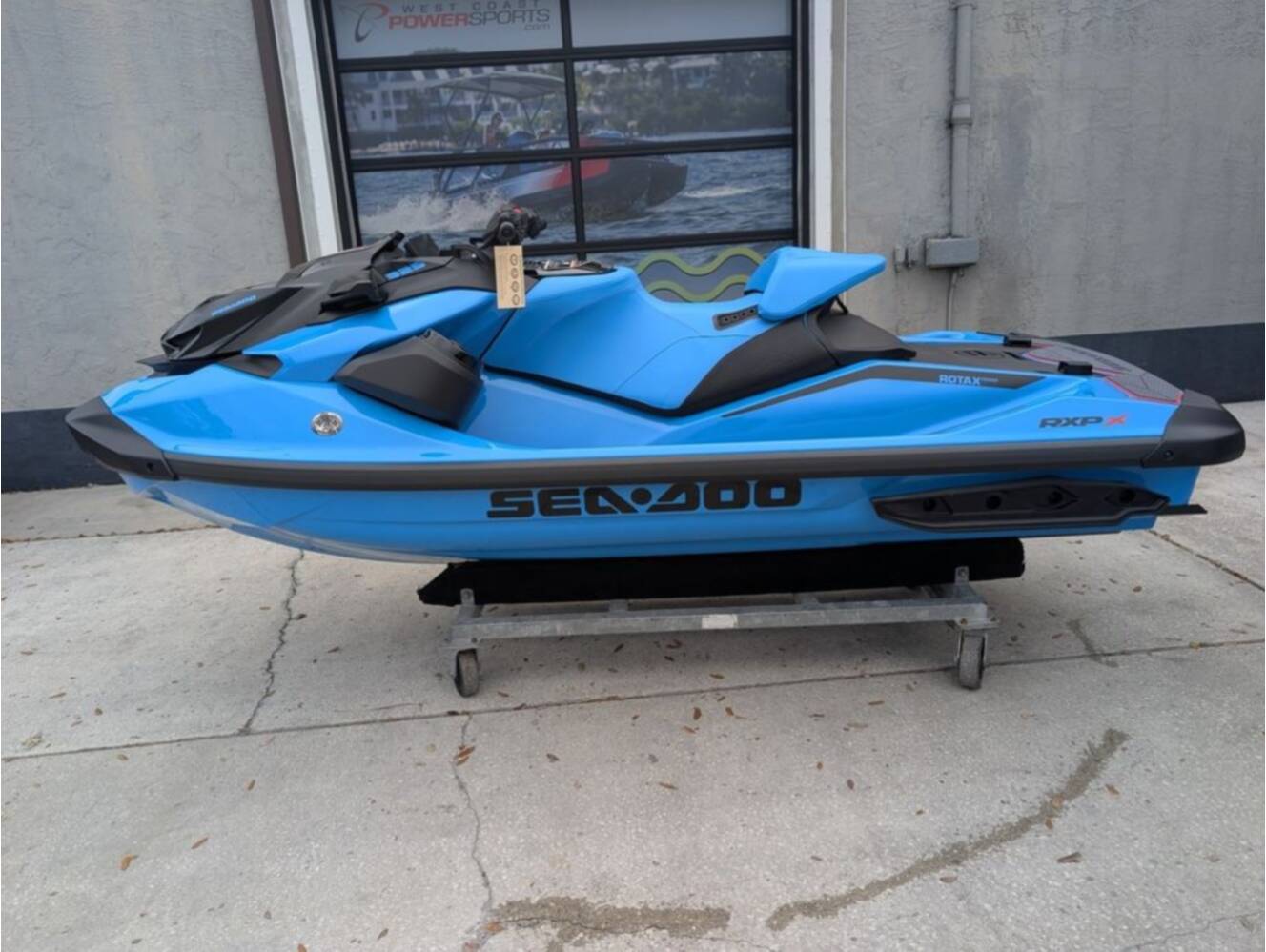 A photo of this 2026 Sea-Doo RXP-X 325 Tech, BRP Premium A, iBR Gulfstream Blue P