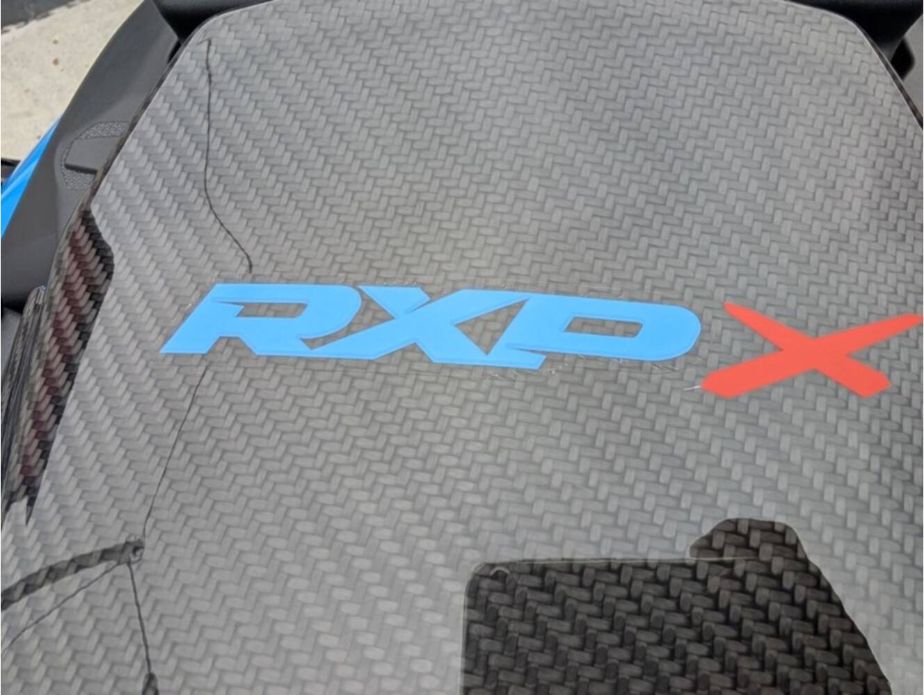 A photo of this 2026 Sea-Doo RXP-X 325 Tech, BRP Premium A, iBR Gulfstream Blue P