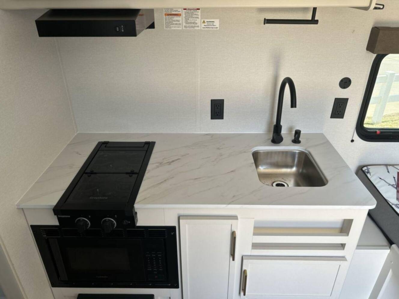 A photo of this 2027 Grand Design Transcend Lite 121RBL