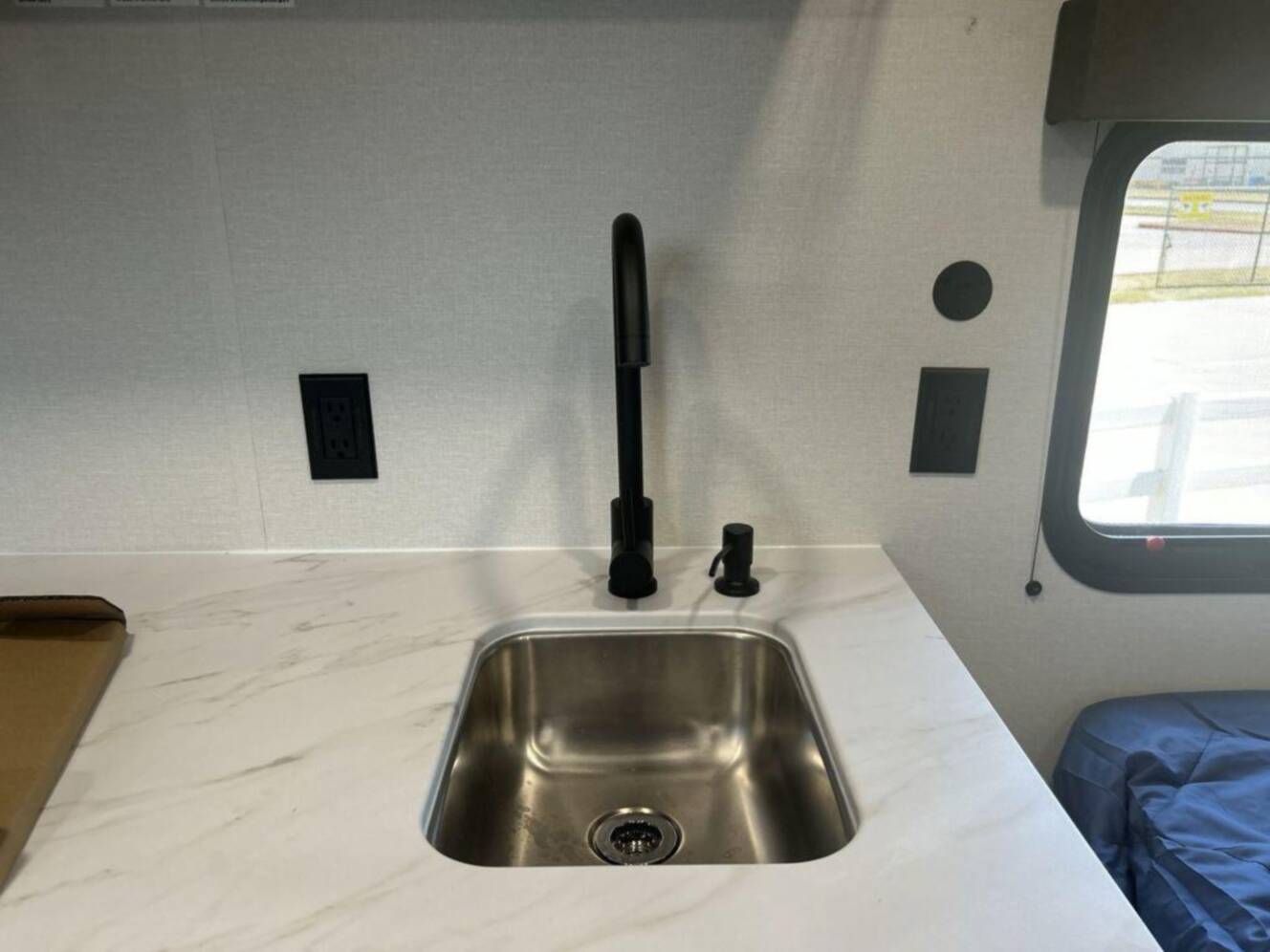 A photo of this 2027 Grand Design Transcend Lite 121RBL