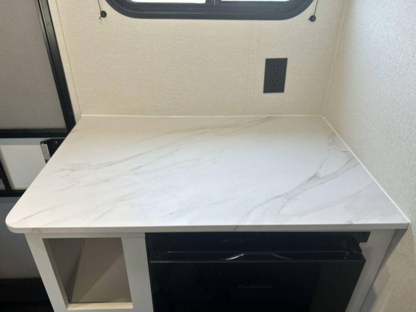 A photo of this 2027 Grand Design Transcend Lite 121RBL