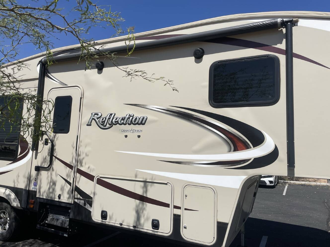 A photo of this 2017 Grand Design REFLECTION 303RLS