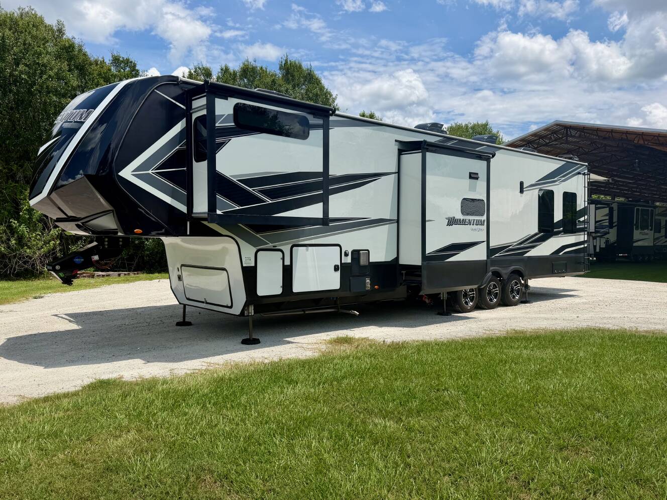 A photo of this 2021 Grand Design MOMENTUM 397TH