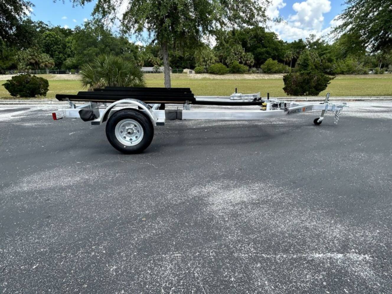 A photo of this 2026 Magic Tilt DOUBLE PWC TRAILER