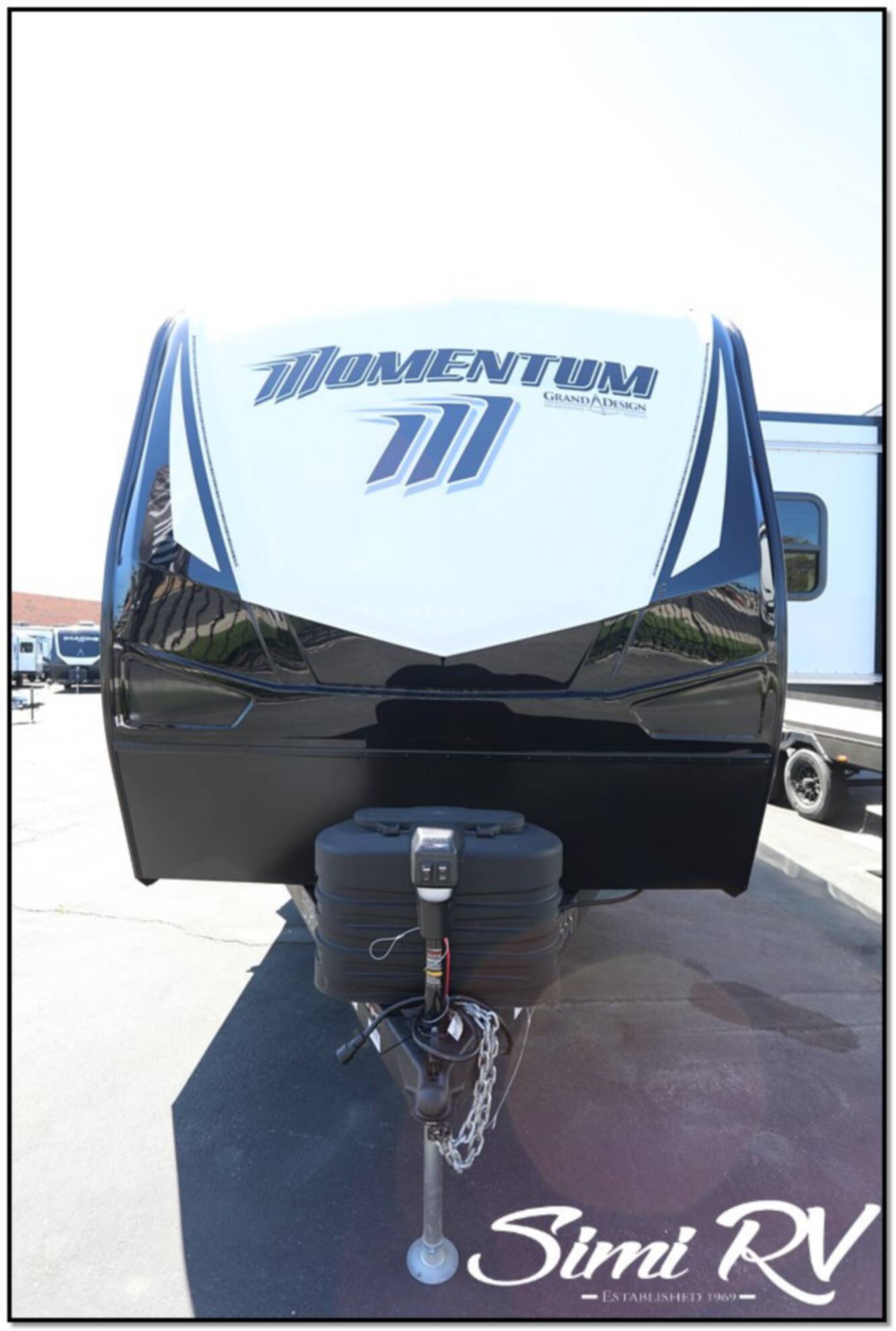 A photo of this 2026 Grand Design Momentum G Class (Travel Trailer) 21G